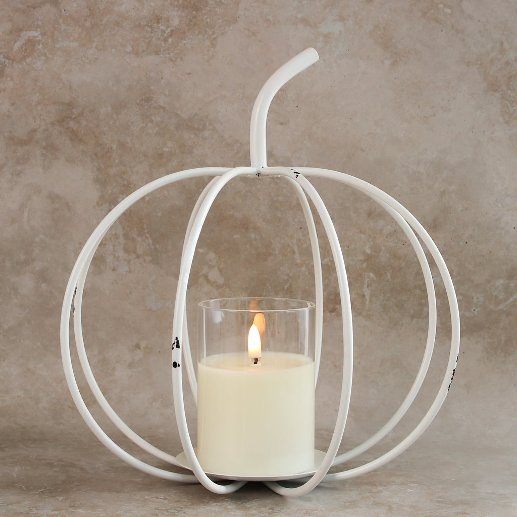 10.75"H x 10"W White Metal Cage Pumpkin, a cozy accent for fall gatherings.