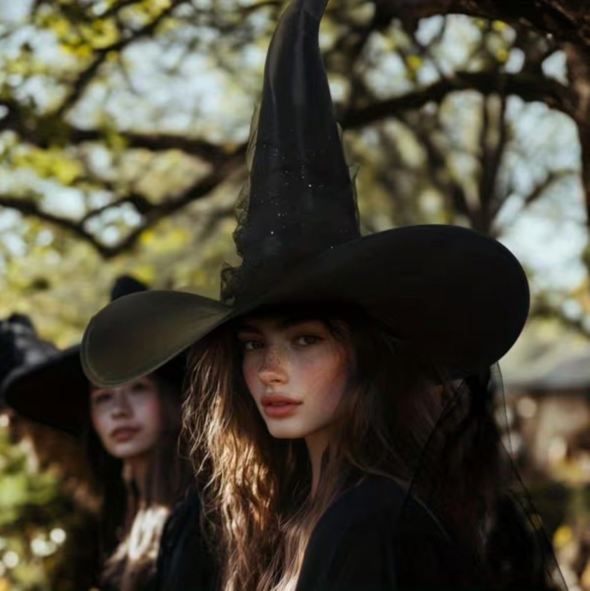 Black Witch Hat with Glitter Star Veil and Wide Brim Pointed Cone Design