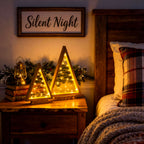 Timber Triangle Trees Set of Two in a Wooden Finish with Golden Fairy Lights at 14 and 10 Inches Tall