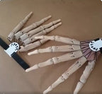 Articulated Finger Extensions Pair with Clawed Digits for Halloween Costumes