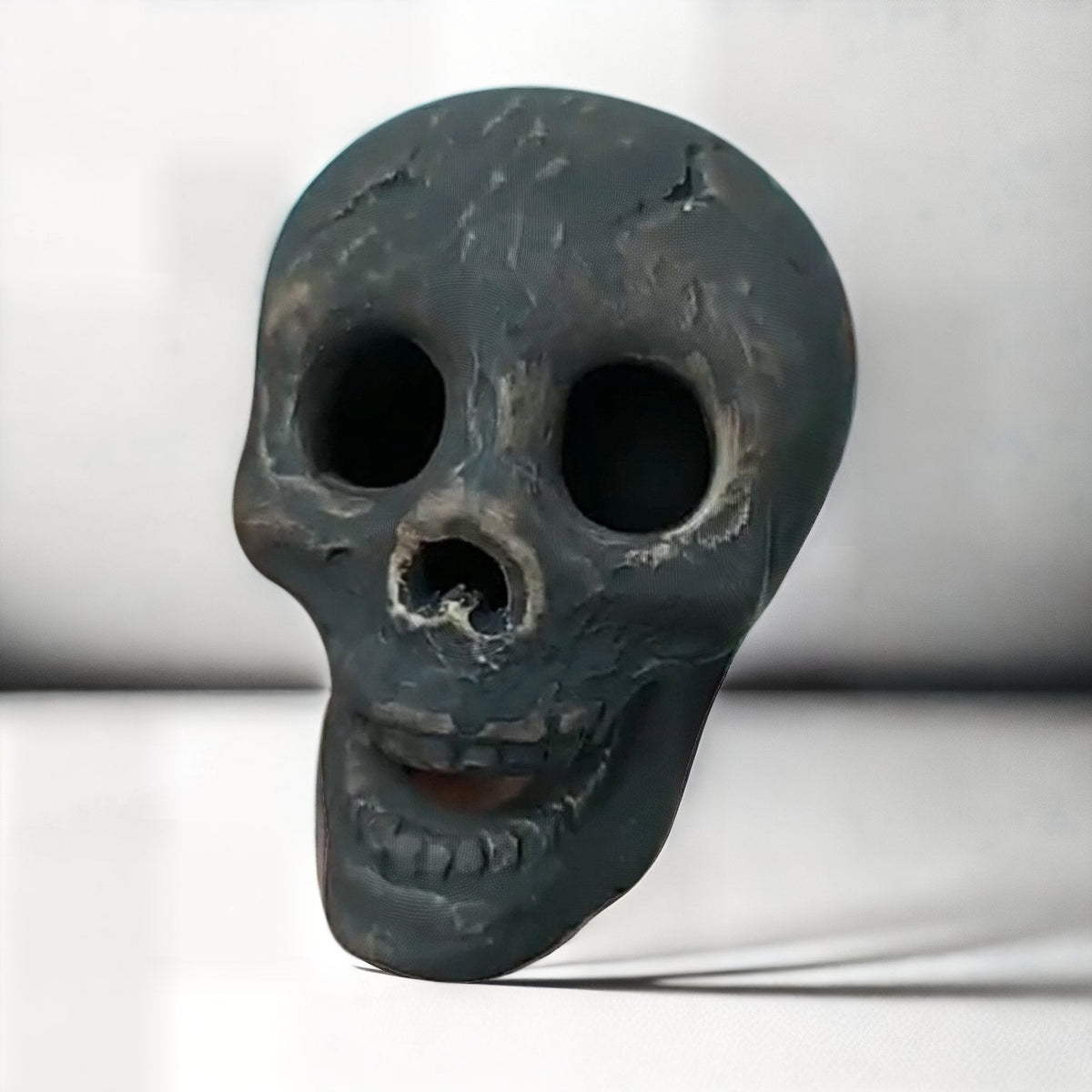 Ceramic Fire Pit Skull with Hollow Eyes for Halloween Bonfires and Campfires