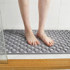 Suction Cup Shower Mat with a Textured Surface and Water Drainage in Seven Colors