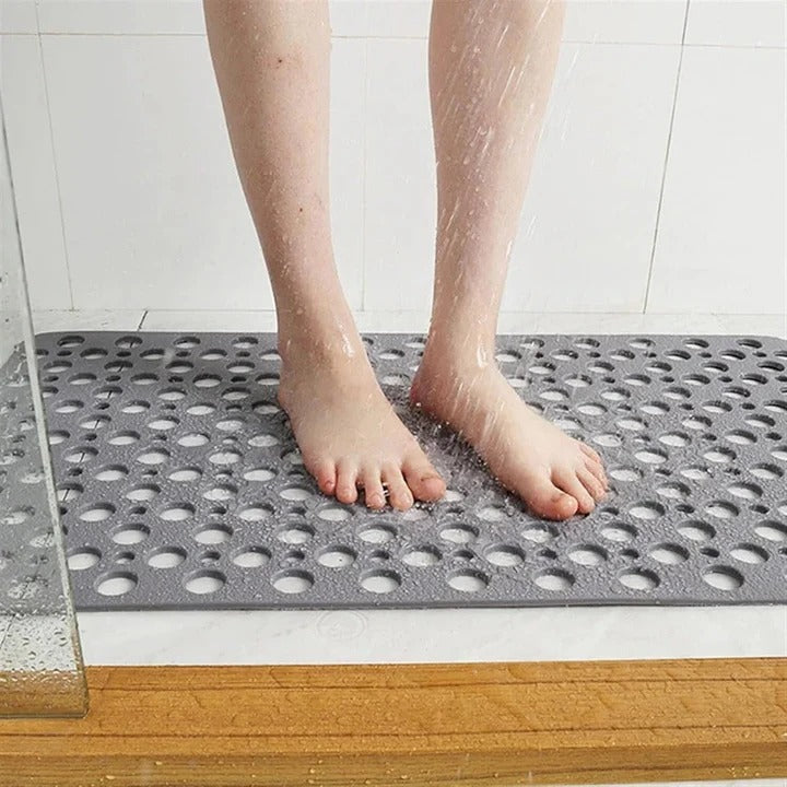 Suction Cup Shower Mat with a Textured Surface and Water Drainage in Seven Colors